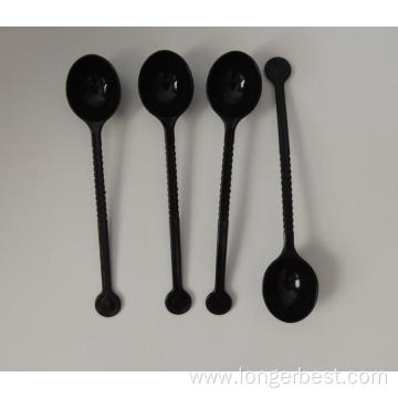 Disposable colored plastic coffee spoon